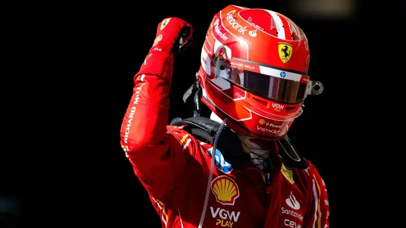 Charles Leclerc celebrating with his helmet on after winning the Monaco Grand Prix last year, his first Formula 1 victory in front of his home crowd.