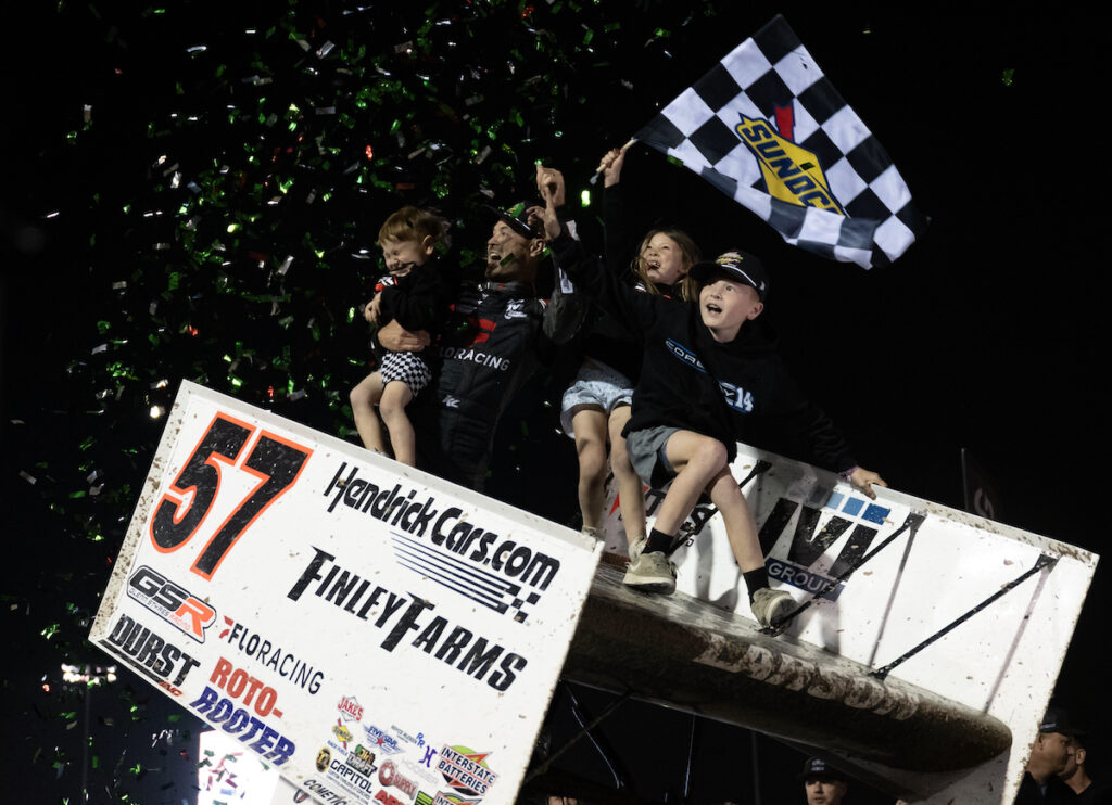 Larson beats Corey Day in 0.096-second photo finish