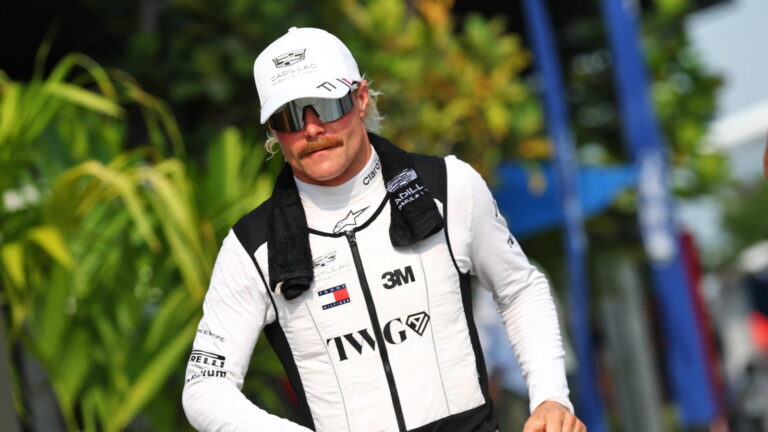 Valtteri Bottas cycles from Malaysia to Singapore for GP